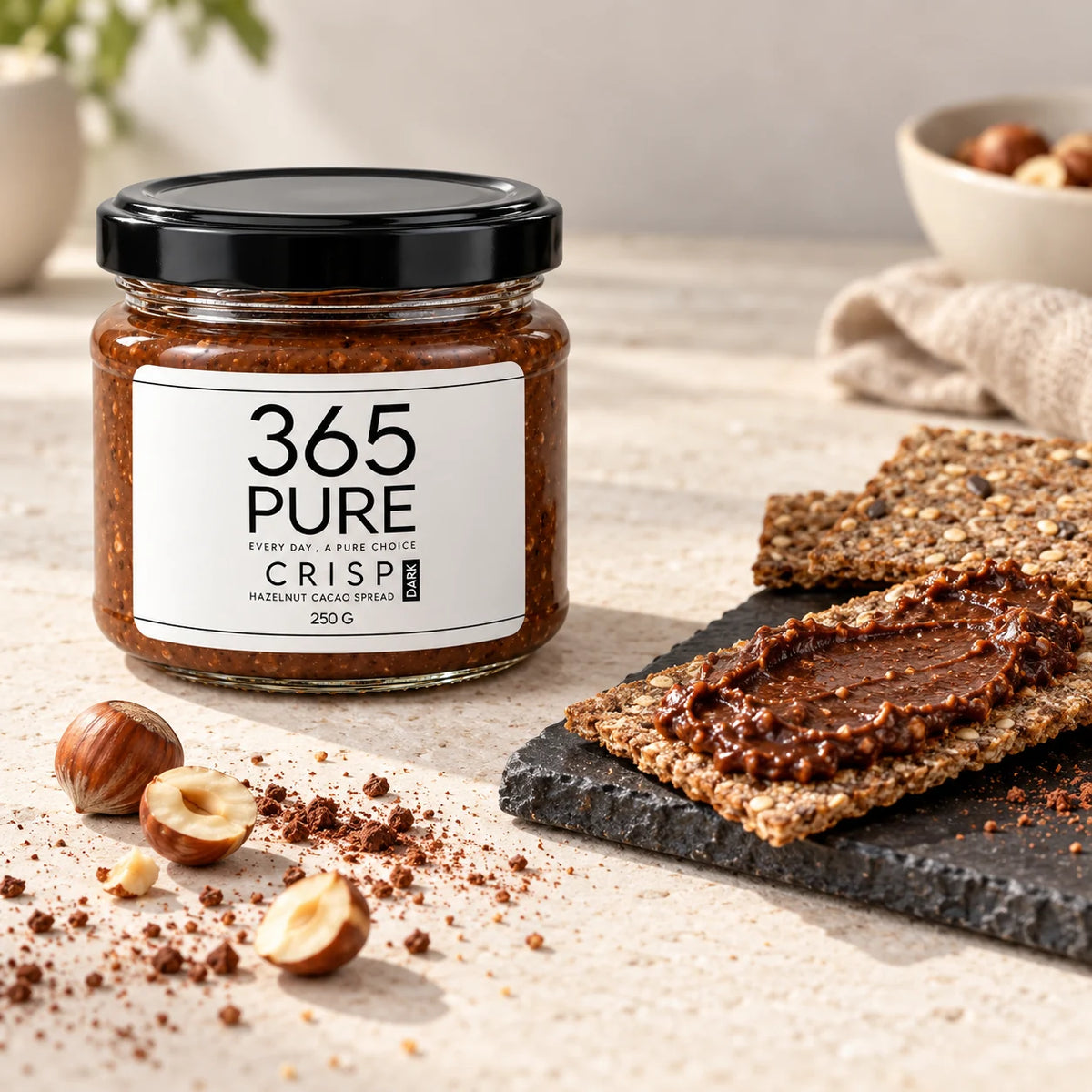 365Pure CRISP DARK jar beside rye crispbread spread with dark hazelnut cacao