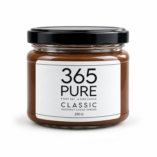A glass jar of 365 Pure Classic Hazelnut Cacao Spread with a white label and black lid, set against a plain white background.